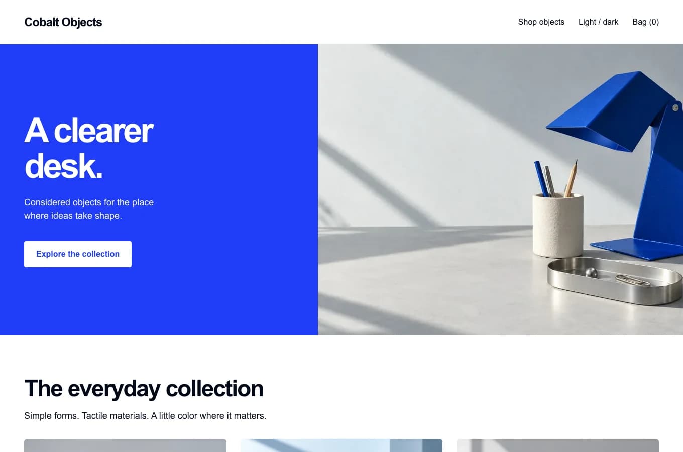 Desktop view of the Cobalt demo storefront, showing its blue split hero and desk objects collection